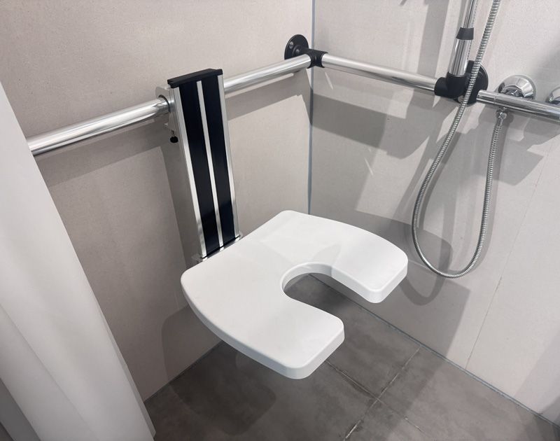 Portable bathroom seat for elderly care